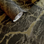 N3600280H Stunning charcoal textured marble with beautiful gold metallic detail. Paste the wall vinyl. Easy to hang and washable.