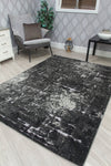 Abstract Mirage Dark Grey Fabulous abstract and modern design in dark grey.