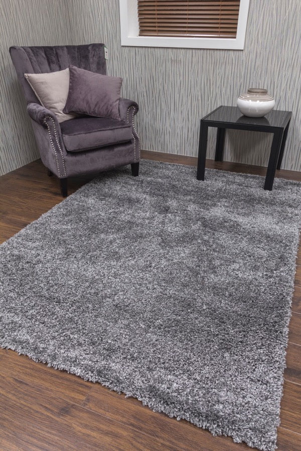 Dreamy Dark Grey Beautiful dark grey shaggy rug.
