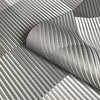 b570003b Modern geometric 3D effect wallpaper in grey with metallic silver highlights.