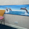 Dolphins Frieze 80011 (wide border) Gorgeous blue Dolphins Frieze (wide border). 46.5cm wide x 400 long. Paste the wall. *Chair used to illustrate scale*