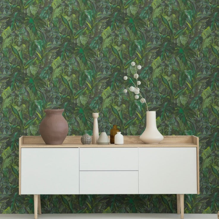 n100855107e Captivating jungle inspired leaf design in greens. Easy-hang paste the wall vinyl.