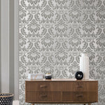 nm170005c Beautiful classical damask motif in grey and silver. This fabulous design is taken from the archive collection, with designs dating from the past 100 years, reinvented to reflect contemporary tastes. Stunning paste the wall designer wallpaper.