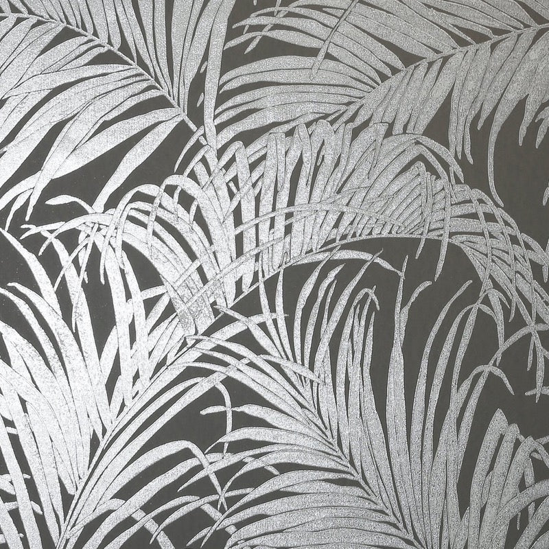 n90300305a Silver metallic foil palm leaf print on a contrasting matt gunmental grey background. Paste the wall.