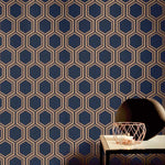 vs90677604a An elegant and contemporary geometric design with gold metallic hexagons on a matt navy blue background.