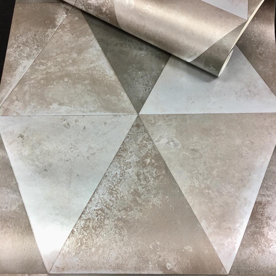 w15244502m Stylish modern triangle geometric with a metallic finish in taupe.